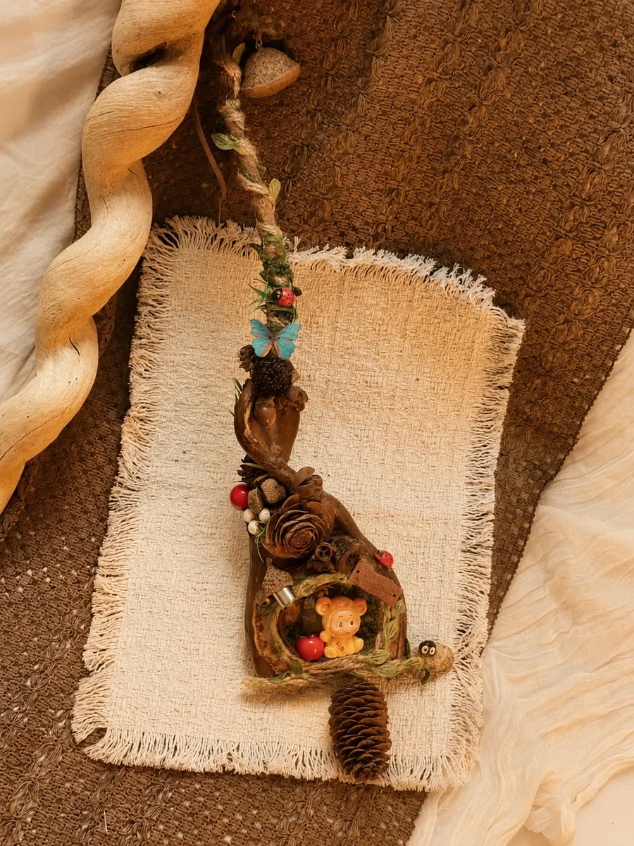 Hanging handmade pod doll displayed with natural textures and warm indoor light