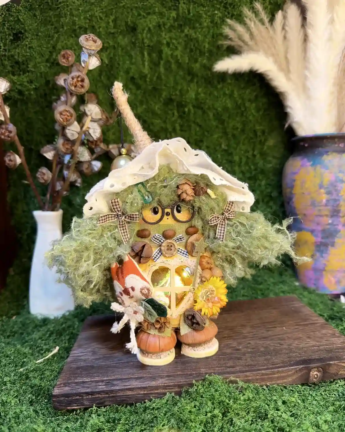 Handmade pod doll displayed as a plant lover gift