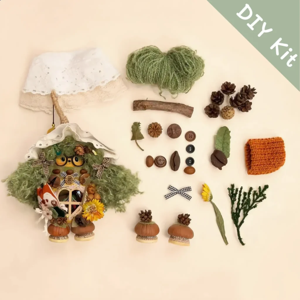 Woodland Green Hair Pod Doll DIY kit flat lay with white hood glasses pumpkin shoes sunflower pinecones and handmade craft materials