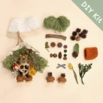 Woodland Green Hair Pod Doll DIY kit flat lay with white hood glasses pumpkin shoes sunflower pinecones and handmade craft materials