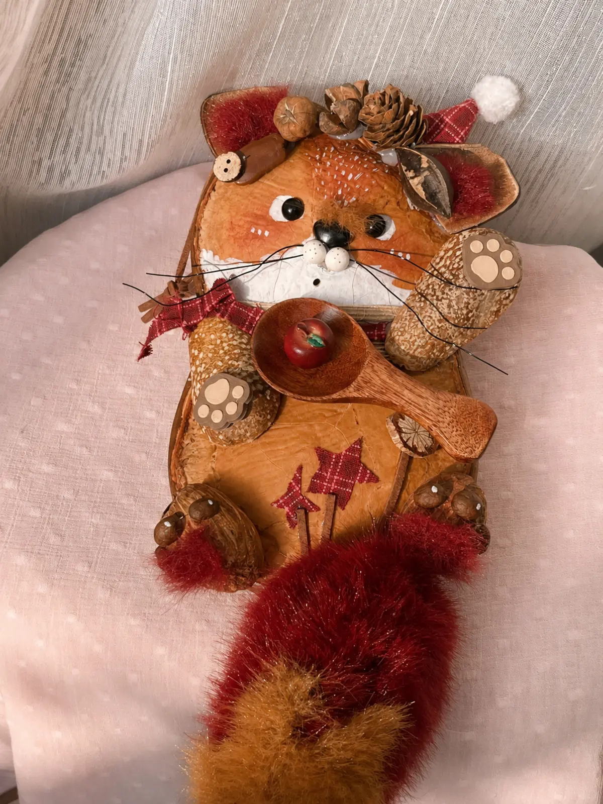 Handmade fox Poddoll displayed on a chair with woodland-inspired details