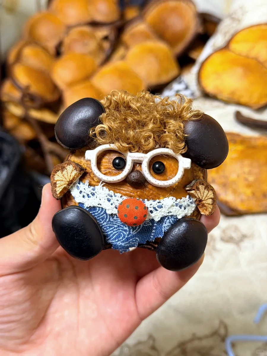 Handmade Poddoll character with glasses, curly hair, and denim clothing