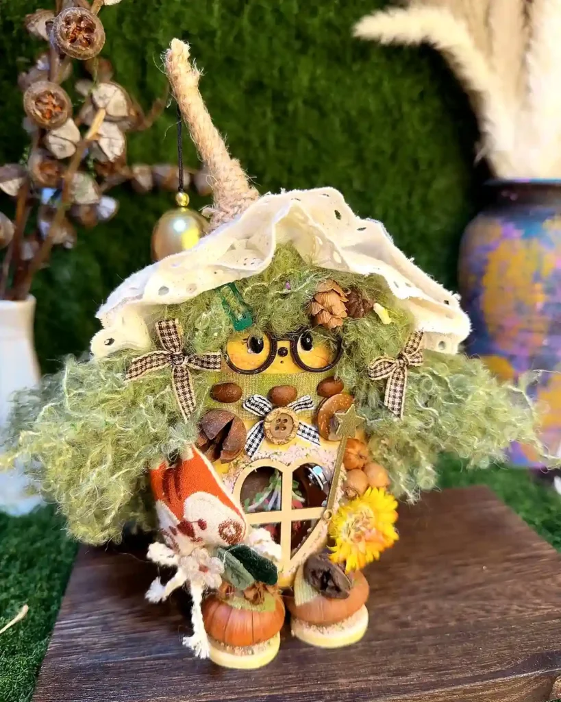 Close-up handmade Poddoll figurine with natural seed pod texture and tiny details