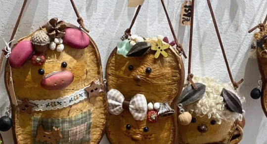 Hanging handmade Poddolls with different strange little character faces