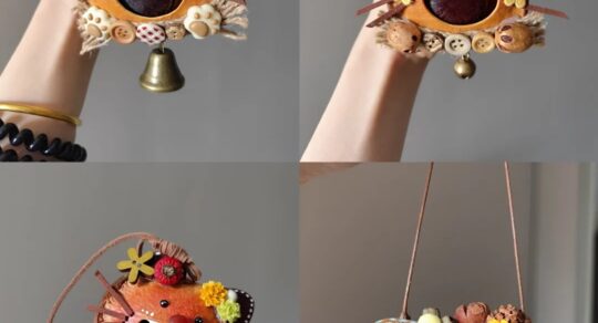 Four handmade open-mouth Poddolls with cat-like and animal-inspired features, floral details, paws, and hanging cords